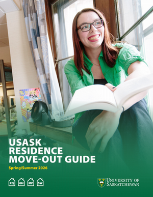 A student sits by a window in a dorm-style room, holding and looking at an open book. The space includes a curtain, a small fan, and a colorful poster in the background. Overlaid text reads “USask Residence Move-Out Guide”.